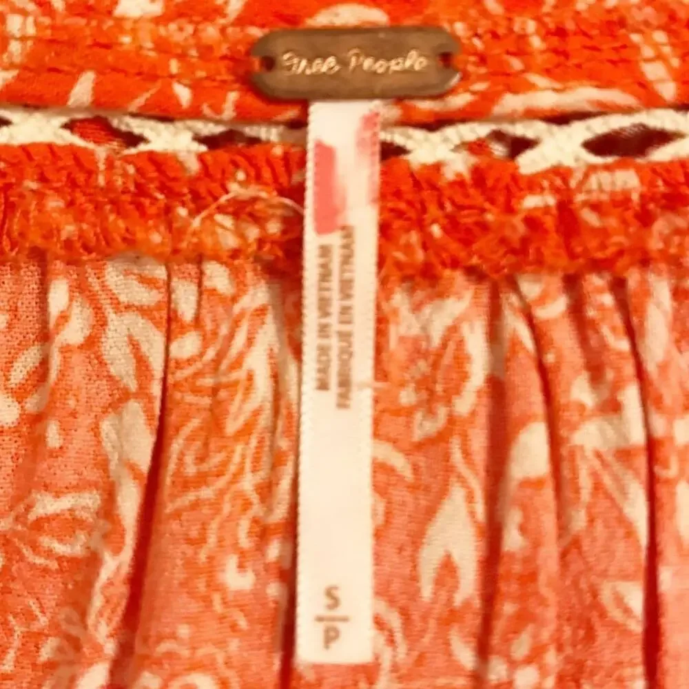 FREE PEOPLE Talk About It Orange Print Peasant Top With Crochet Trim, S